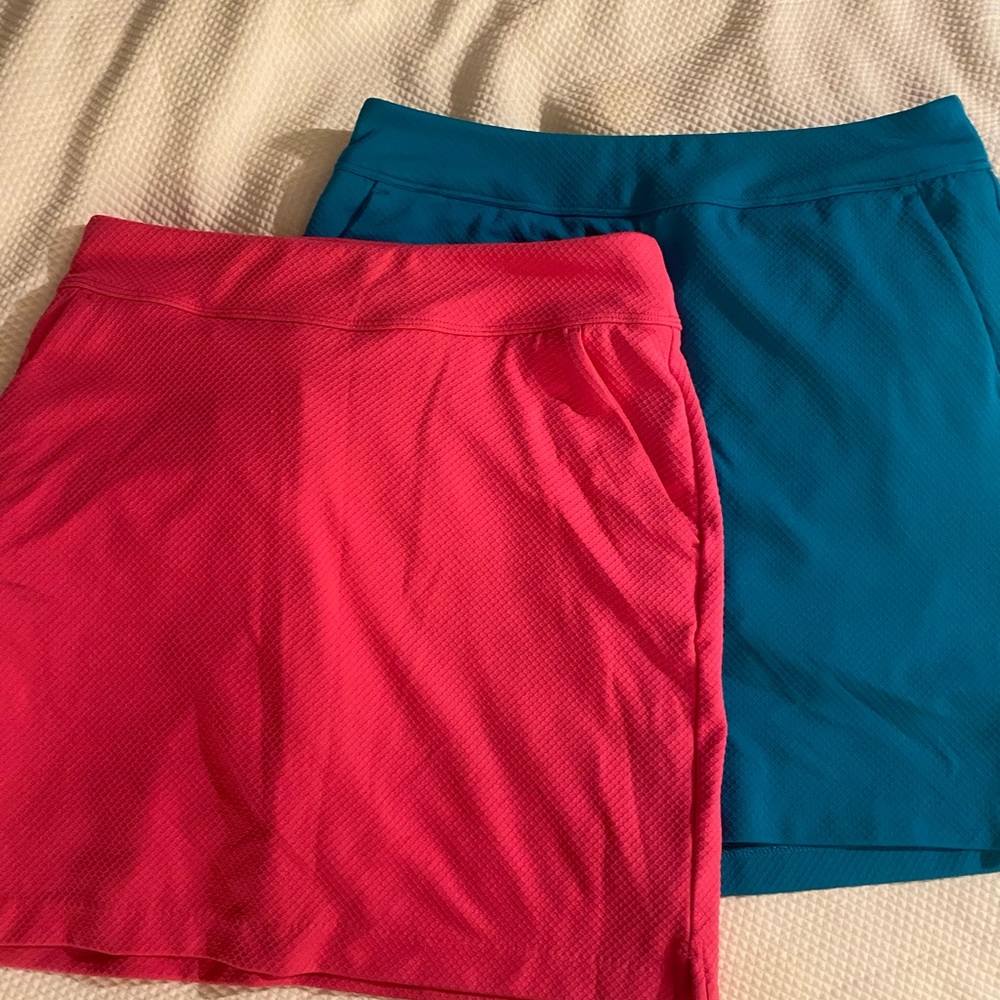 Pink and blue golf skorts